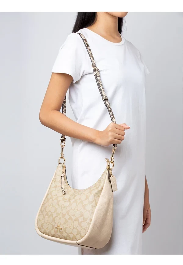 Coach 蛇紋背帶腋下包 