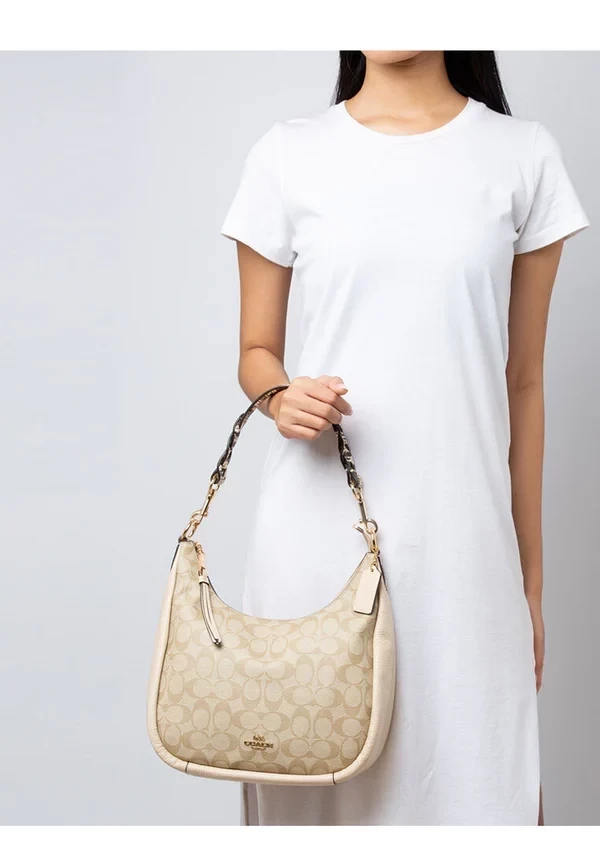 Coach 蛇紋背帶腋下包 