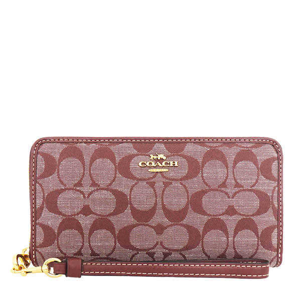 COACH 經典滿版手拿拉鍊長夾老花緹花織布 