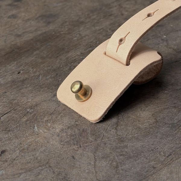 彈性有餘束線器 