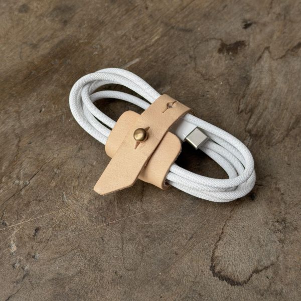 彈性有餘束線器 