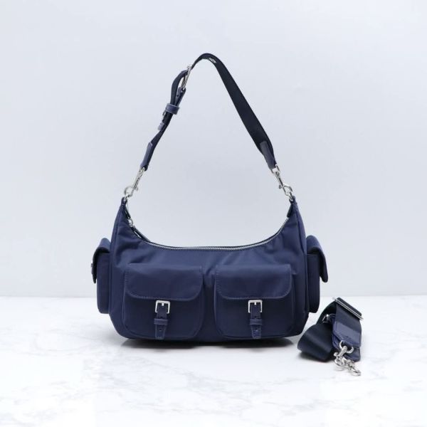 Tory Burch 尼龍側邊口袋款單肩包/半月包 附兩條背帶 日本 Tory Burch 尼龍側邊口袋款單肩包/半月包 附兩條背帶