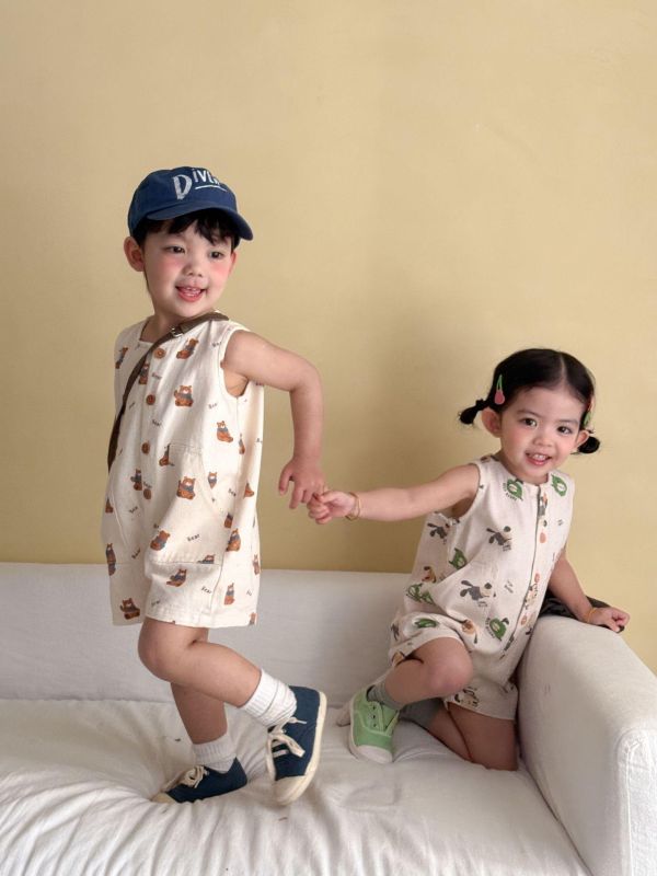 可愛卡通休閒開釦雙口袋連身裝 