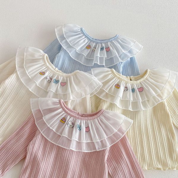 網紗荷葉領卡通素色彈力上衣 