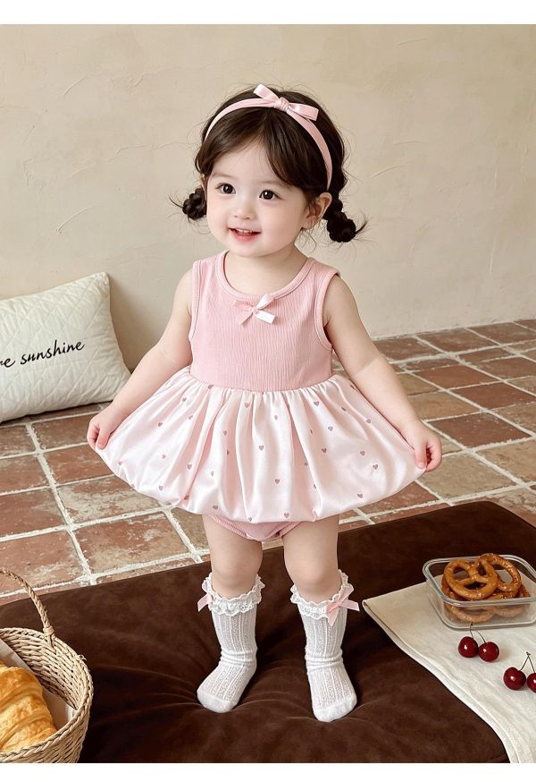 甜美蝴蝶結後露背點點包屁裙 