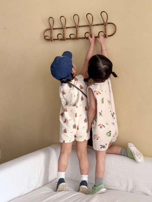 可愛卡通休閒開釦雙口袋連身裝 