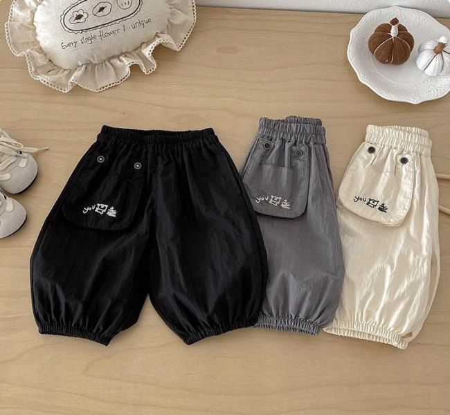 素色口袋塗鴉You字母束口褲 