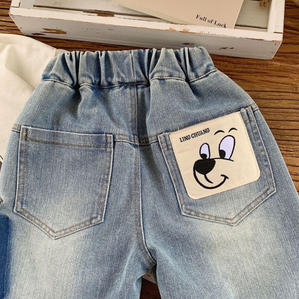 水洗暈染可愛布標七分牛仔褲 