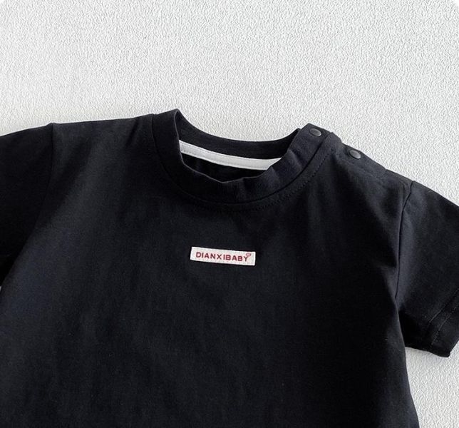 素色布標極簡上衣/豹紋短褲 