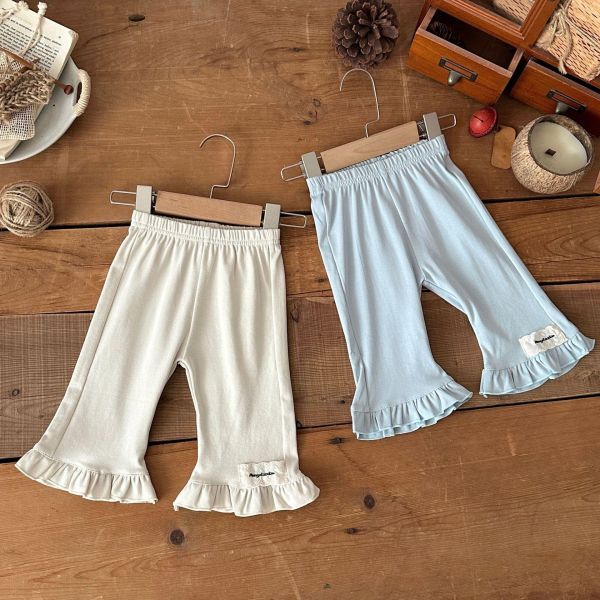 木耳卷邊素色彈力喇叭褲 