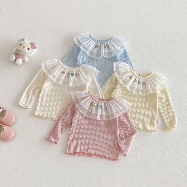 網紗荷葉領卡通素色彈力上衣 