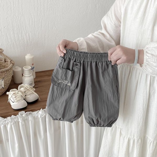 素色口袋塗鴉You字母束口褲 