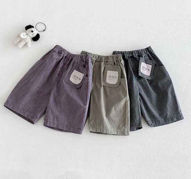 三隻狗狗吊牌感素色長褲 