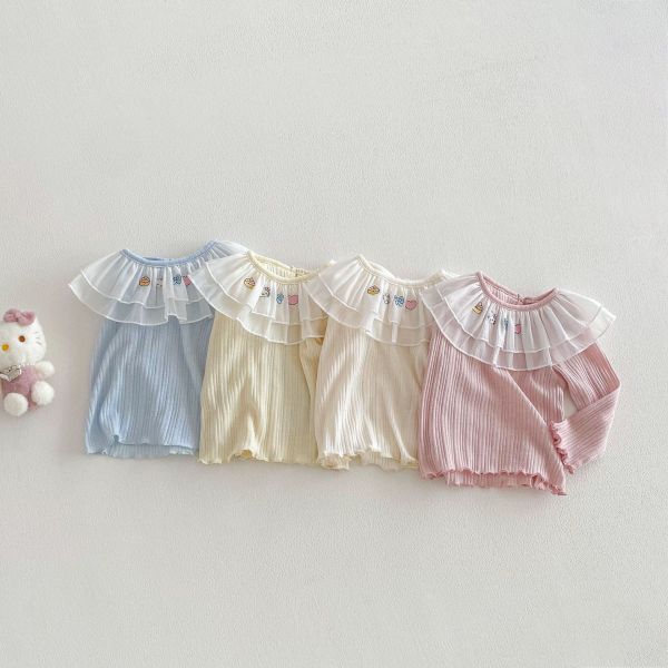 網紗荷葉領卡通素色彈力上衣 