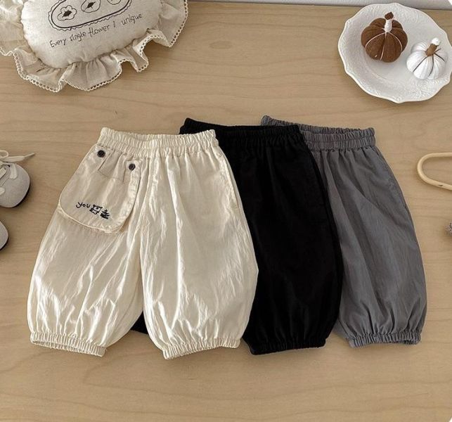 素色口袋塗鴉You字母束口褲 