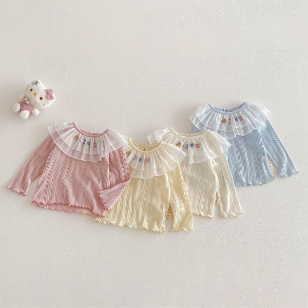 網紗荷葉領卡通素色彈力上衣 