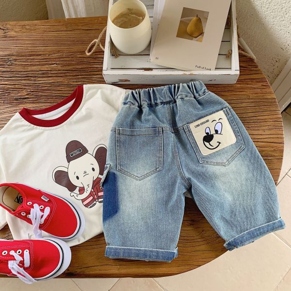 水洗暈染可愛布標七分牛仔褲 