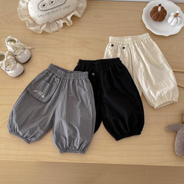 素色口袋塗鴉You字母束口褲 