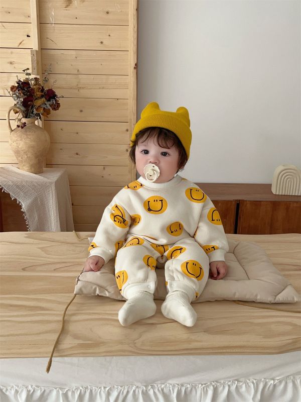 『現貨80cm』滿版可愛笑臉加厚連身裝 