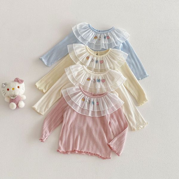 網紗荷葉領卡通素色彈力上衣 