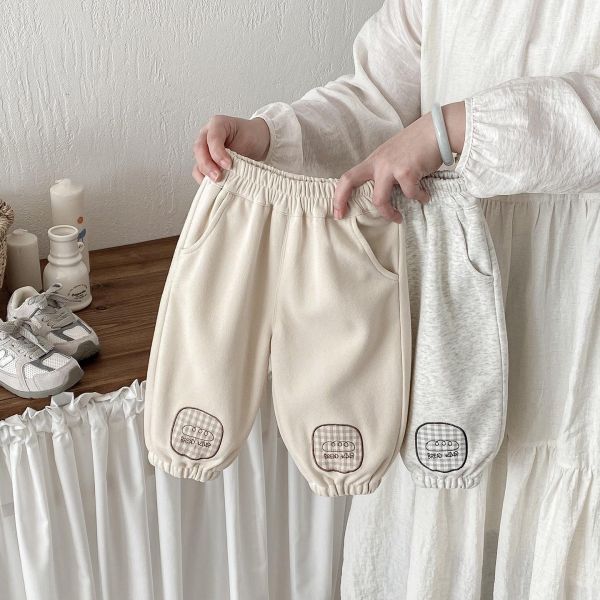 可愛補丁貼標素色束口褲 