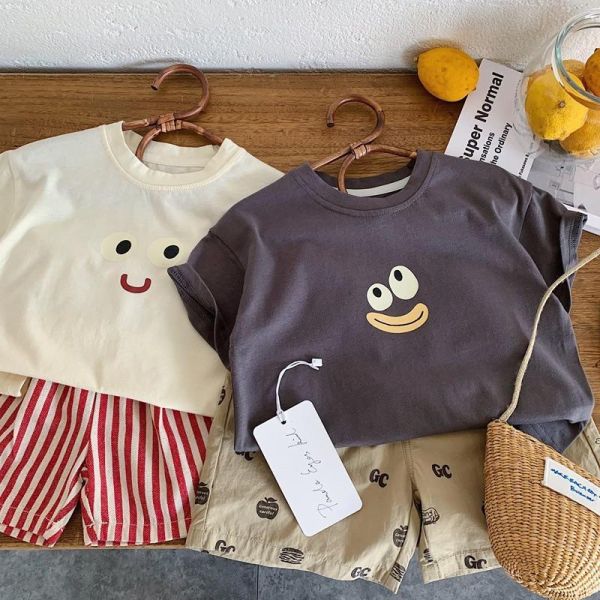 可愛表情印花素色上衣 