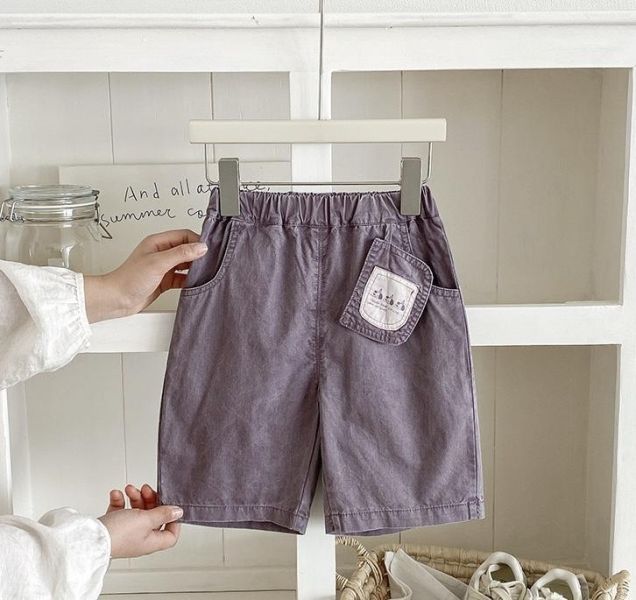 三隻狗狗吊牌感素色長褲 