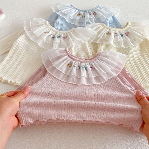 網紗荷葉領卡通素色彈力上衣 