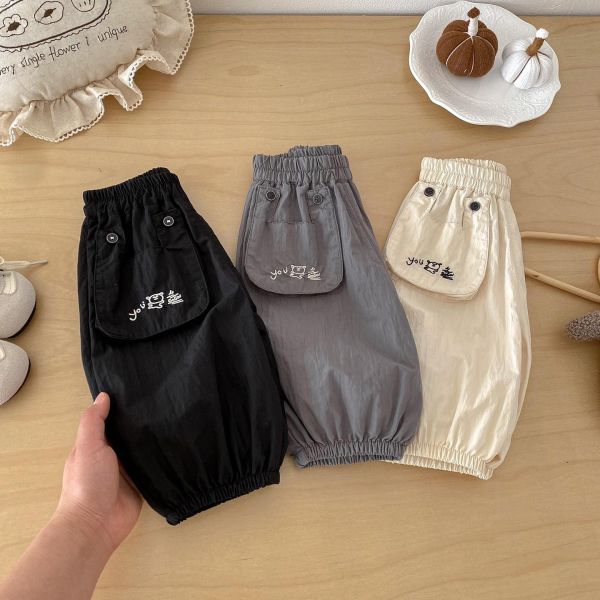 素色口袋塗鴉You字母束口褲 