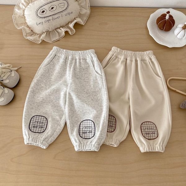 可愛補丁貼標素色束口褲 