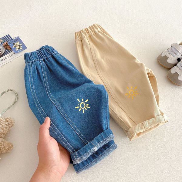 極簡太陽刺繡牛仔休閒長褲 