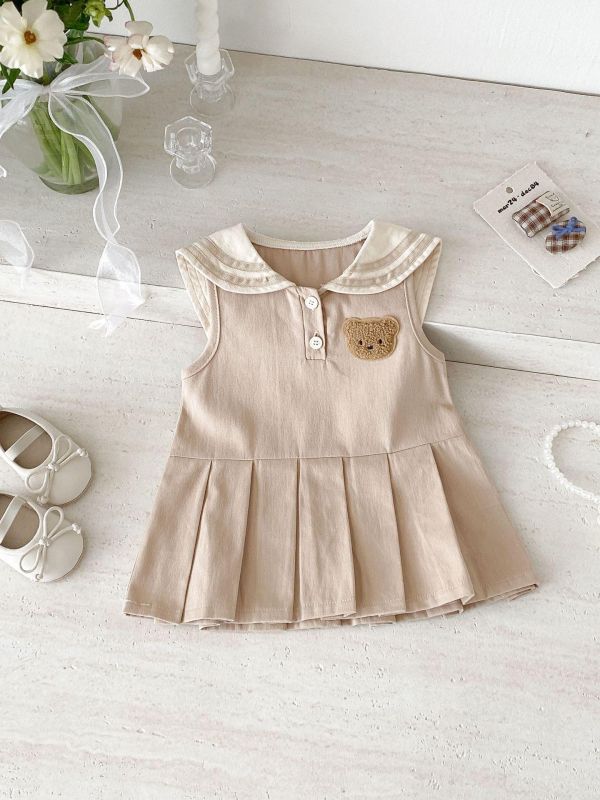 學院風小熊背心式百褶連身裙 