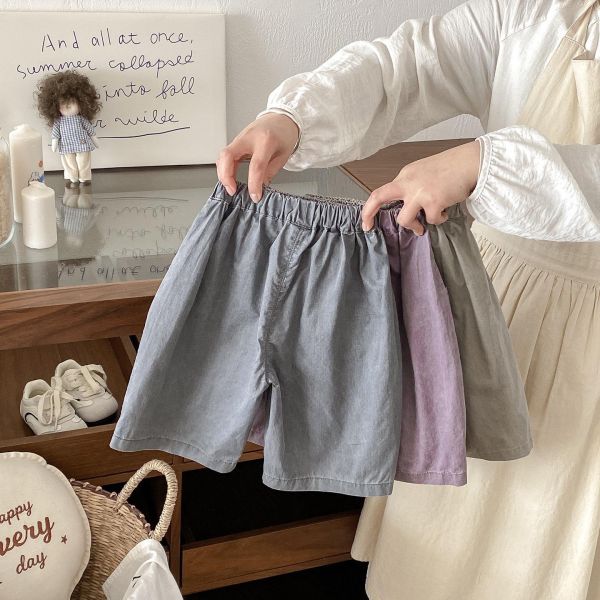 三隻狗狗吊牌感素色長褲 