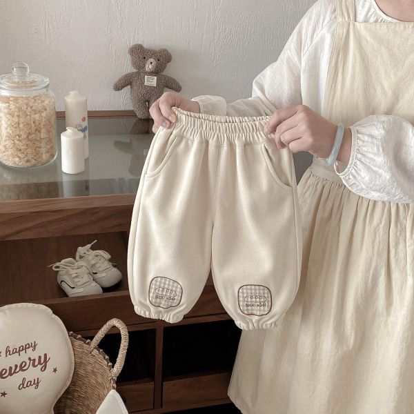 可愛補丁貼標素色束口褲 