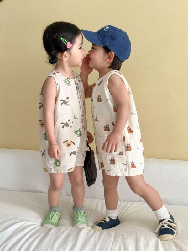 可愛卡通休閒開釦雙口袋連身裝 