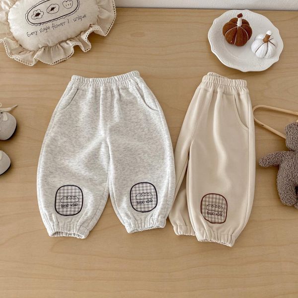 可愛補丁貼標素色束口褲 