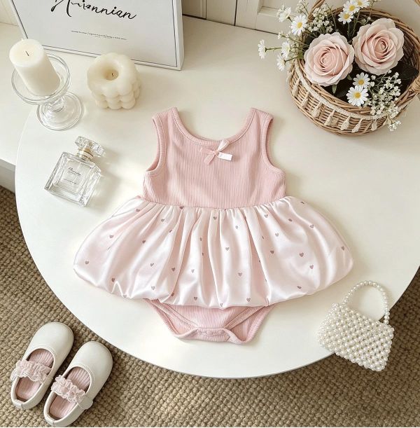 甜美蝴蝶結後露背點點包屁裙 