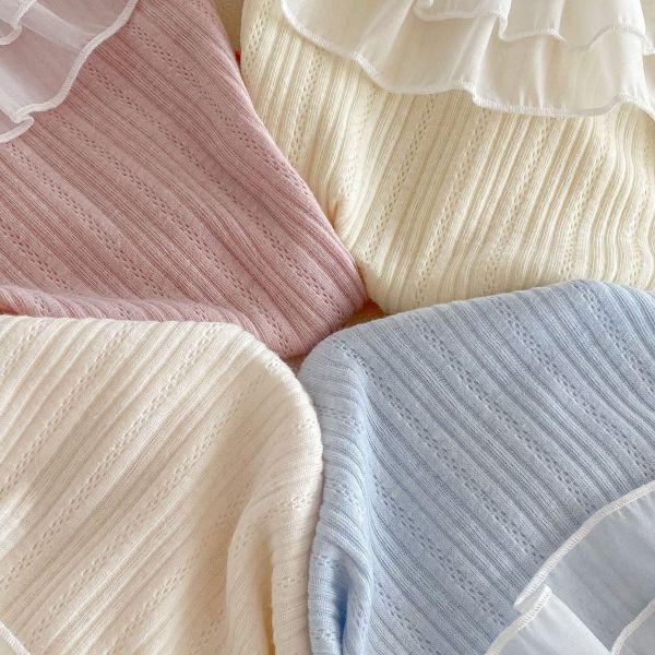 網紗荷葉領卡通素色彈力上衣 