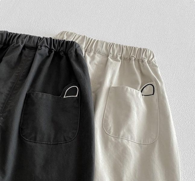 造型反摺格紋素色休閒長褲 