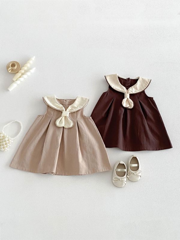 學院風領結削肩連身洋裝 