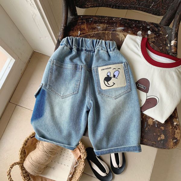 水洗暈染可愛布標七分牛仔褲 