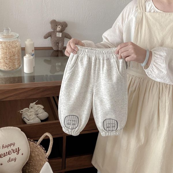 可愛補丁貼標素色束口褲 