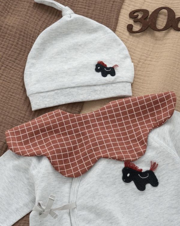 新生兒小馬貼布側開反包手連身裝 