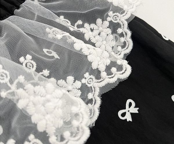 蝴蝶結印花蕾絲拼接棉質長褲 