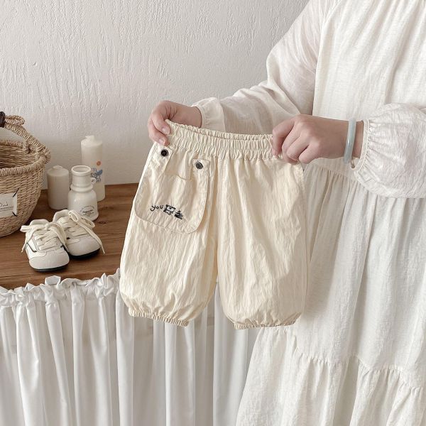 素色口袋塗鴉You字母束口褲 