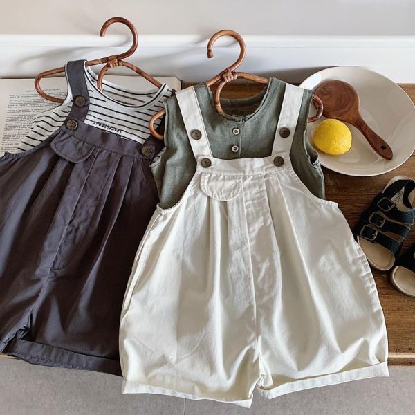 素色單口袋休閒吊帶短褲 