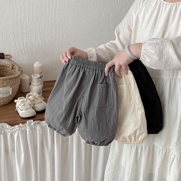 素色口袋塗鴉You字母束口褲 