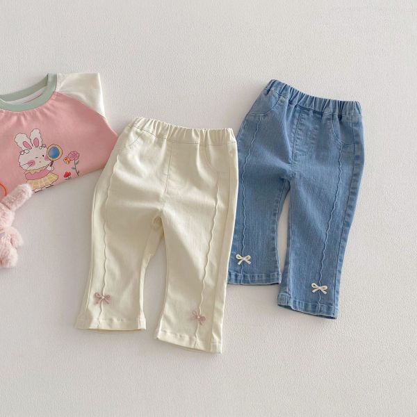 波紋剪裁蝴蝶結兩色牛仔長褲 