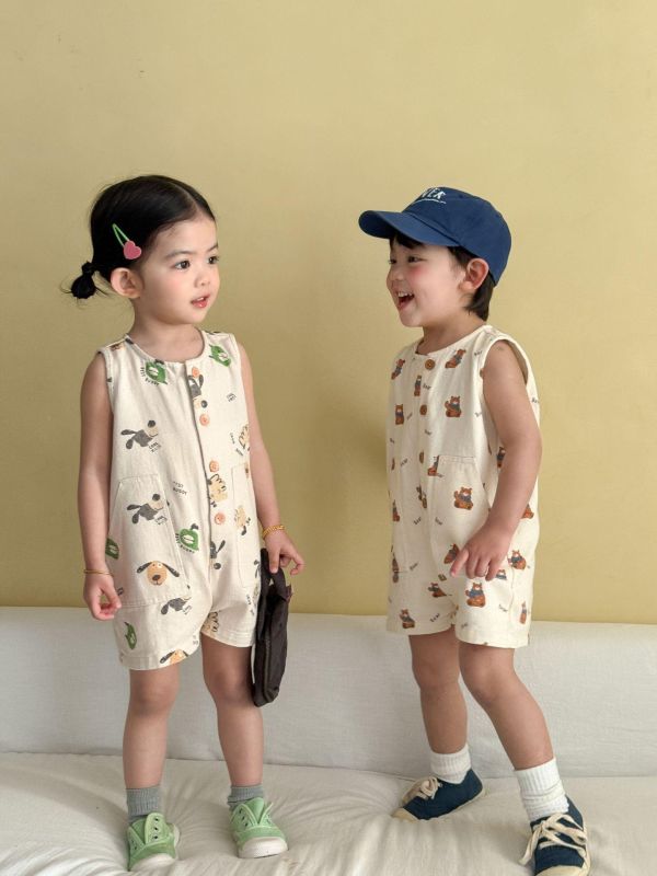 可愛卡通休閒開釦雙口袋連身裝 