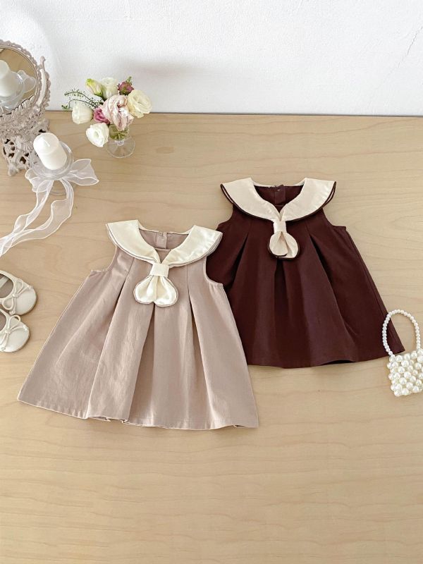 學院風領結削肩連身洋裝 